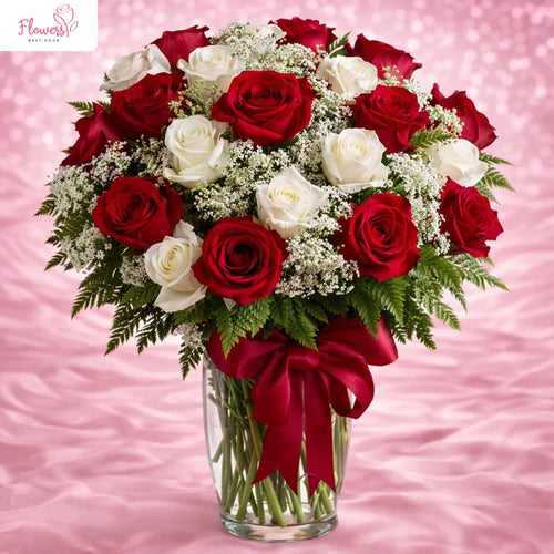 16 Red Roses in a Lovely Glass Vase